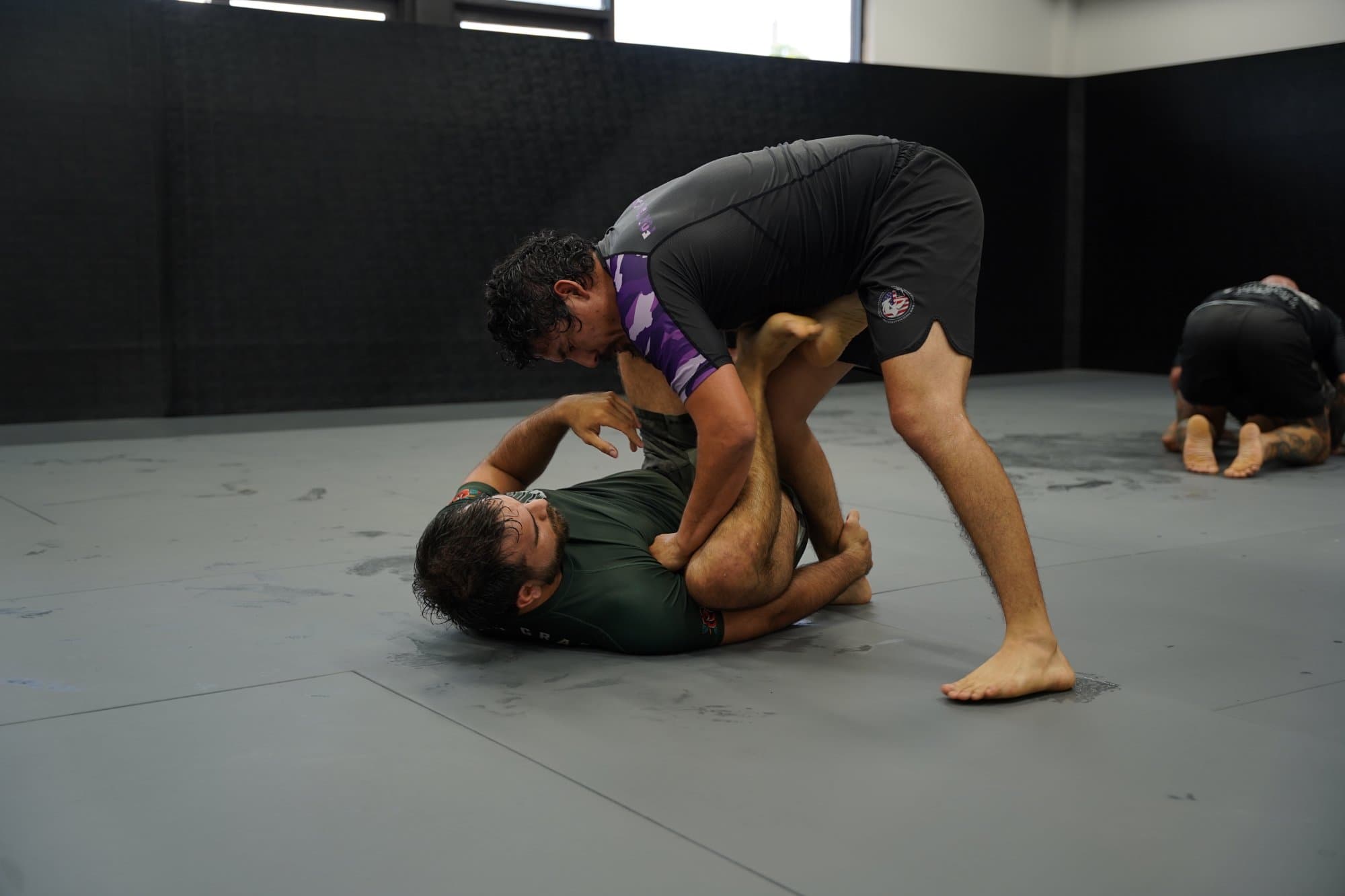 No-Gi BJJ students training at Ground Game Theory in Miami No-Gi BJJ students training at Ground Game Theory in Miami